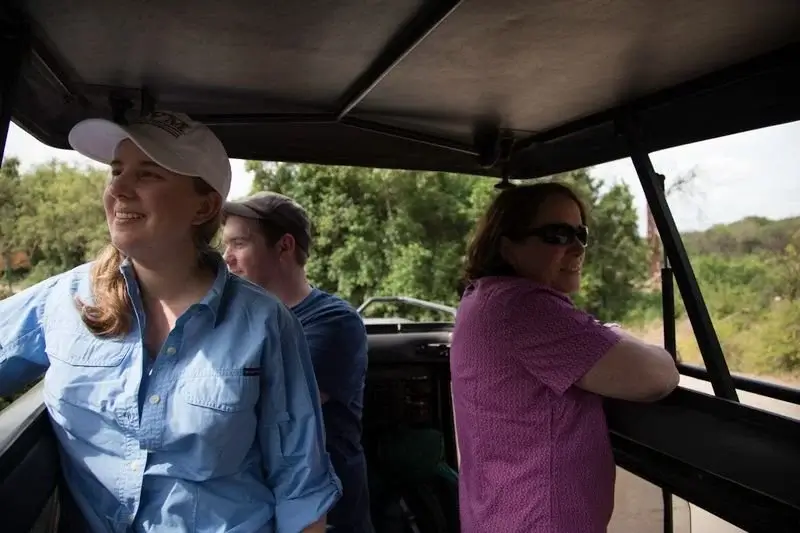 Group of travellers on a shared safari vehicle watching elephants in Tarangire National Park